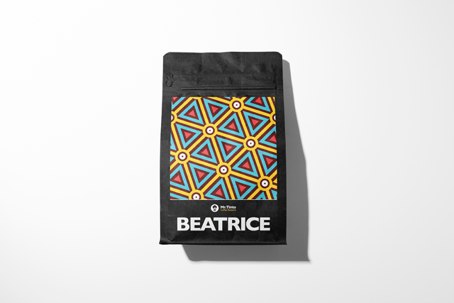Beatrice – smooth and balanced Colombian specialty coffee by Mr. Tinto Coffee Roasters, retail bag with gold geometric pattern.